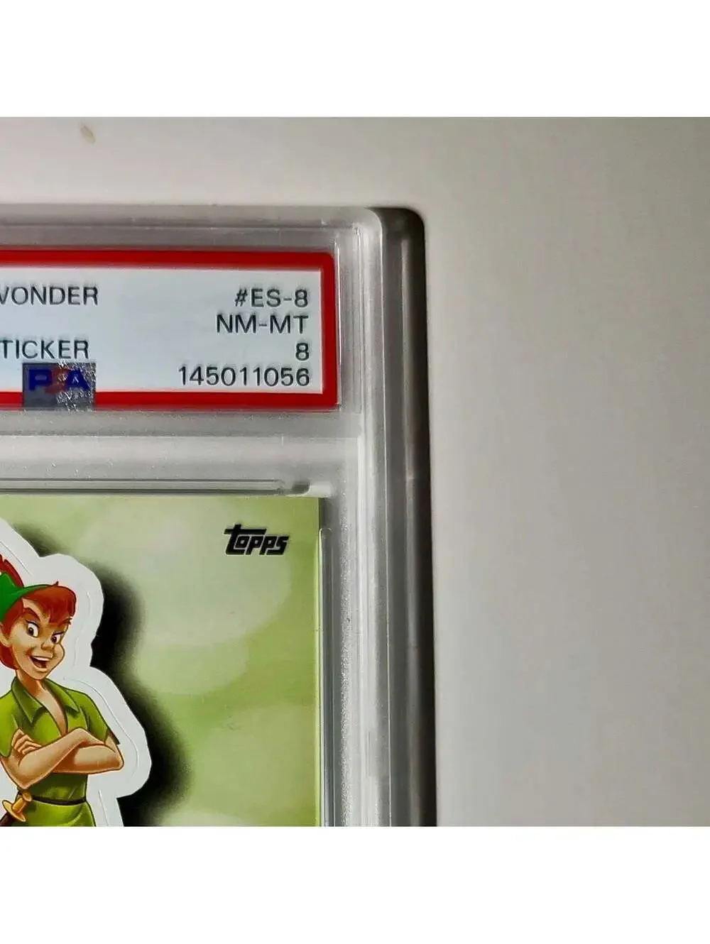 Peter Pan 2025 Topps Disney #ES-8 Enchanted Sticker Card Peter Pan PSA 8